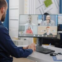 Man Use Video Conferencing Software