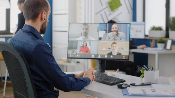 Man Use Video Conferencing Software