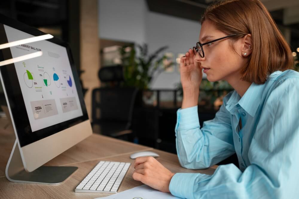 Woman check Marketing Issues in Computer Screen